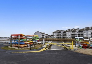 FREE DAILY ACTIVITIES INCLUDED! Only a few miles from Bethany Beach this beautifully decorated second floor unit offers 2 bedrooms with 2 full baths and is nestled within unspoiled land and gently lapping inland waterways