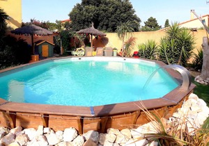 Gite saint julien in rez of garden with terrace swimming pool and games.