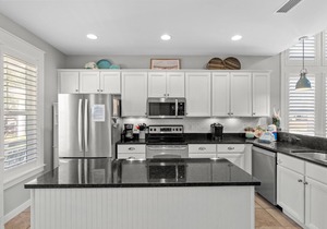 Golf Course Beach Cottage with 2 Golf Carts! Near Beach, Pool, Hot tub, Tram.