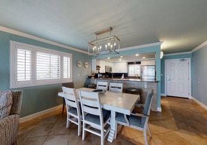 Gorgeous beachfront condo with a pool & private beach access