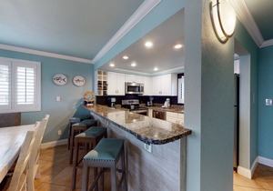Gorgeous beachfront condo with a pool & private beach access