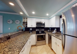 Gorgeous beachfront condo with a pool & private beach access