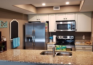 GREAT POOL VIEW LOCATION! STEPS FROM THE POOL AND FISHING PIER!