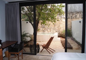 Habitación de lujo con king Size y alberca privada en el centro de Mérida.