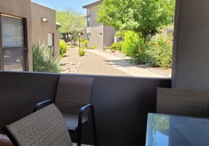 Hacienda in The Desert! Southwest Charm in this easy access 2 bedroom