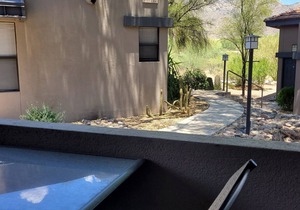 Hacienda in The Desert! Southwest Charm in this easy access 2 bedroom