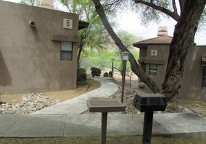 Hacienda in The Desert! Southwest Charm in this easy access 2 bedroom