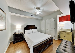 Historic district condo with private riverfront balcony, walk to shops & dining