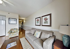 Historic district condo with private riverfront balcony, walk to shops & dining