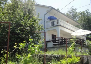 Holiday apartment with air conditioning and terrace with sea view