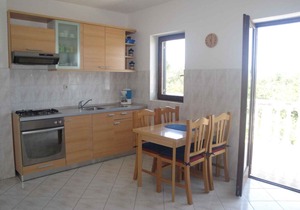 Holiday apartment with air conditioning and terrace with sea view