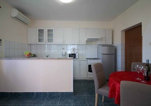 Holiday apartment with balcony, air conditioning and wifi