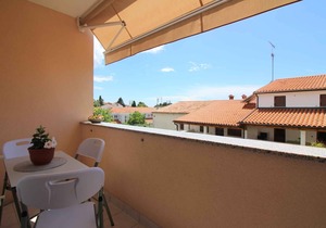Holiday apartment with balcony, air conditioning and wifi