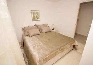 Holiday apartment with pool and 80 m to the beach