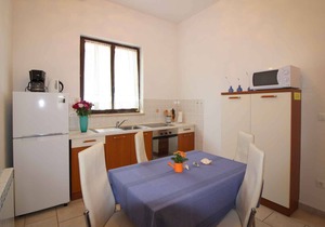 Holiday apartment with terrace and air conditioning