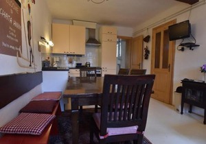 Holiday home in a quiet authentic mountain village with a view of the surrounding hills