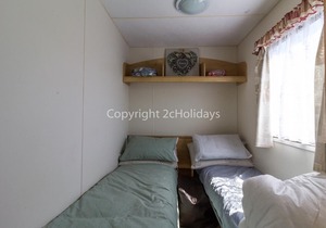Homely 8 berth caravan for hire at St Osyth, near Clacton-on-Sea ref 28081FV