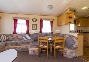Homely 8 berth caravan for hire at St Osyth, near Clacton-on-Sea ref 28081FV