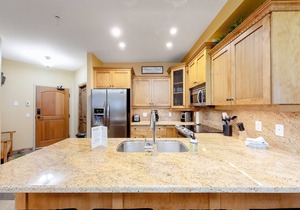 Homey ski-in/out condo with private hot tub & entertainment