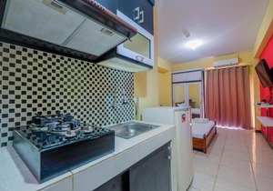 Homey Studio Apartment with Pool View at Bogor Valley By Travelio