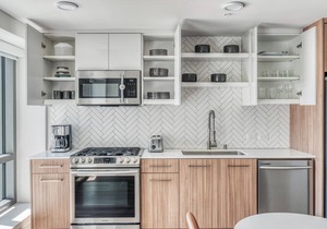 Impeccable Oakland 1BR w/AC, W/D, Sky Deck, next to BART, by Blueground