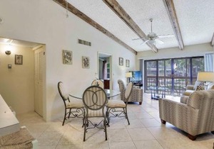 Inland condo with pool and steps to beach/food/shops