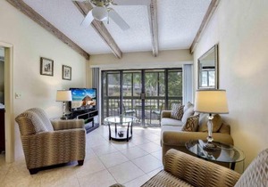 Inland condo with pool and steps to beach/food/shops