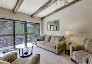 Inland condo with pool and steps to beach/food/shops