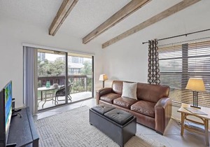 Inviting condo with pool just a steps from the beach