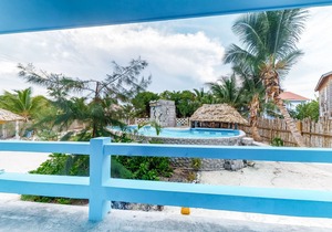 Island Paradise Suite with WiFi, Partial AC & Pool, Rooftop Patio & BBQ Area