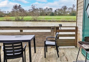 Lakeside Chalet with Private Fishing Pier, Terrace & Family Amenities - Sleeps 7