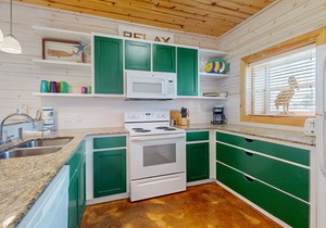Located in Town, Close to beach, Shared Pool, Golf Cart Access