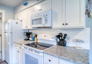 Located right by the large heated pool. Only a block to the beach!