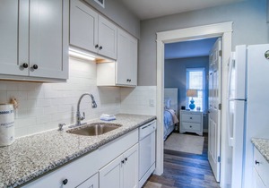 Located right by the large heated pool. Only a block to the beach!