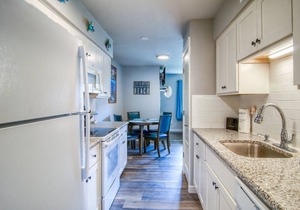 Located right by the large heated pool. Only a block to the beach!