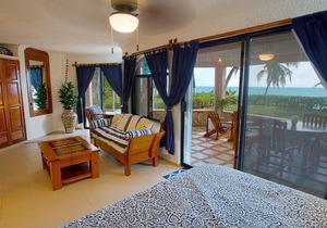 Lovely beachfront 2 BR/2BA condo. Gated community - Pool, Wifi, AC