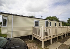 Lovely caravan for hire with decking at Skipsea Sands Holiday Park ref 41161WF