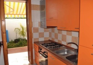 Lovely Holiday Apartment "Casa a Torre dell'Orso PT55" with Garden