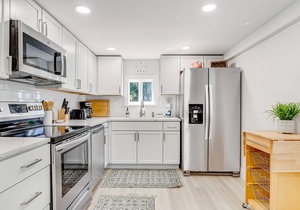 Lower Level of a Duplex with Two Patios & Fast WiFi - 1 Block to the Beach