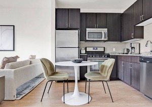 Luxe studio w/W/D, Gym, Rooftop. Steps from T stop by Blueground