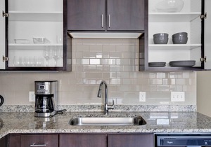 Luxe studio w/W/D, Gym, Rooftop. Steps from T stop by Blueground