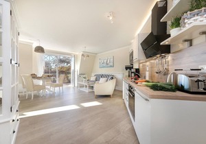 Luxury vacation apartment right by the sea with sauna and fireplace.