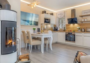 Luxury apartment by the sea with fireplace, wellness area and sauna