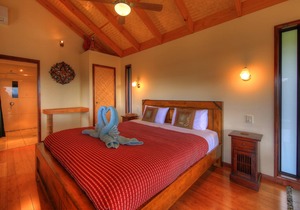 Luxury self-contained villa with king bed, double spa, fireplace, and kitchen.
