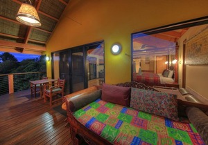 Luxury self-contained villa with king bed, double spa, fireplace, and kitchen.