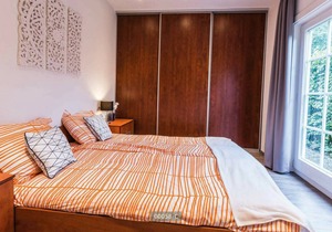 Luxury stand-alone vacation villa for 10 persons located in the forests of Gelderland.