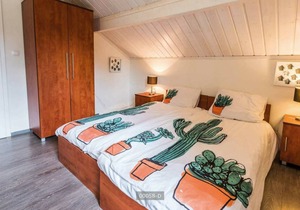 Luxury stand-alone vacation villa for 10 persons located in the forests of Gelderland.