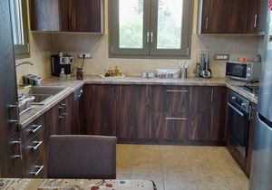 LUXURY VILLA KASTANIA WITH PRIVATE POOL SURROUNDED BY TREES, FLOWERS AND HERBS.