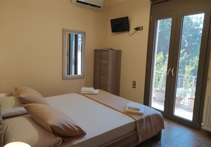LUXURY VILLA KASTANIA WITH PRIVATE POOL SURROUNDED BY TREES, FLOWERS AND HERBS.