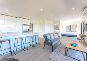 Marama Cottages - Luna Cottage - Located in the heart of Surfdale with outstanding views over the water this brand new 2 bedroom apartment is perfect for family holidays on Waiheke – walking distance to local beaches, off street parking for up to 2 v